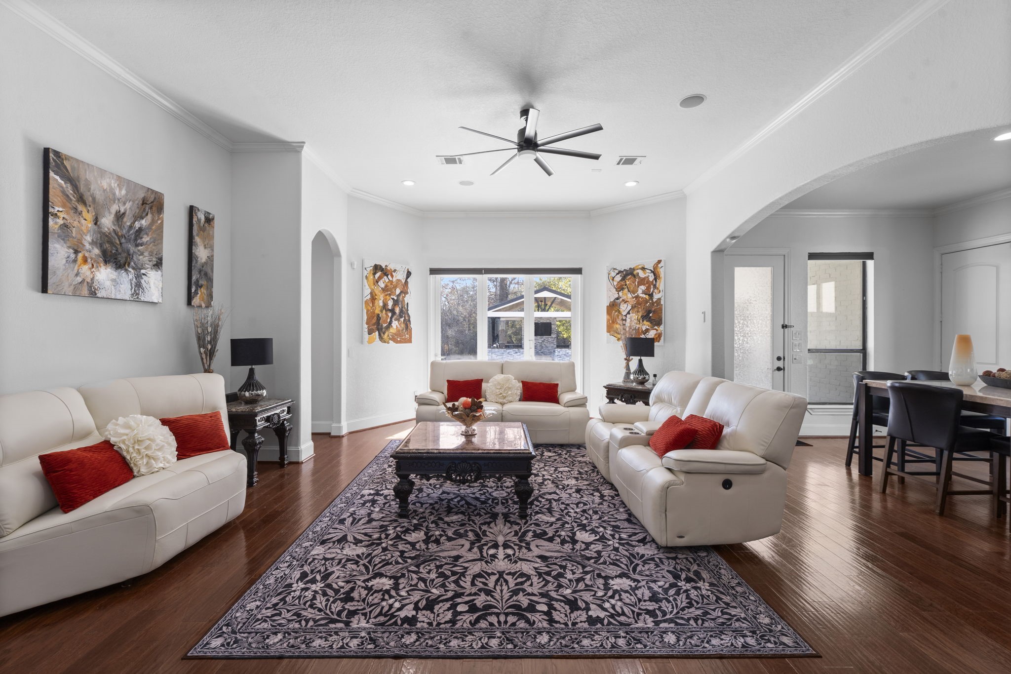 4430 Chateau Creek Way Spring, TX 77386 - Photo 7 of 46 a living room with furniture and wooden floor