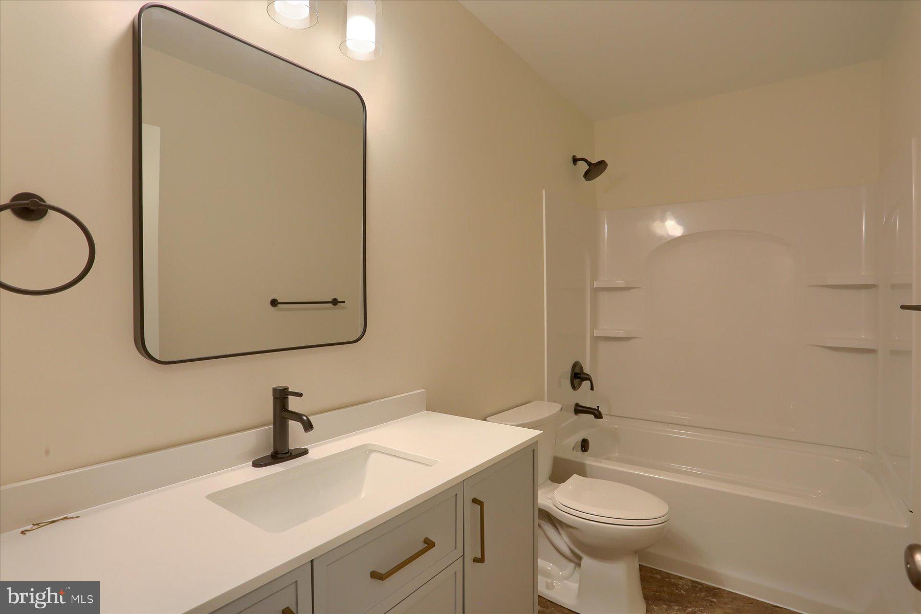 12 South Main Street Marysville, PA 17053 - Photo 15 of 20 a bathroom with a sink a toilet and shower
