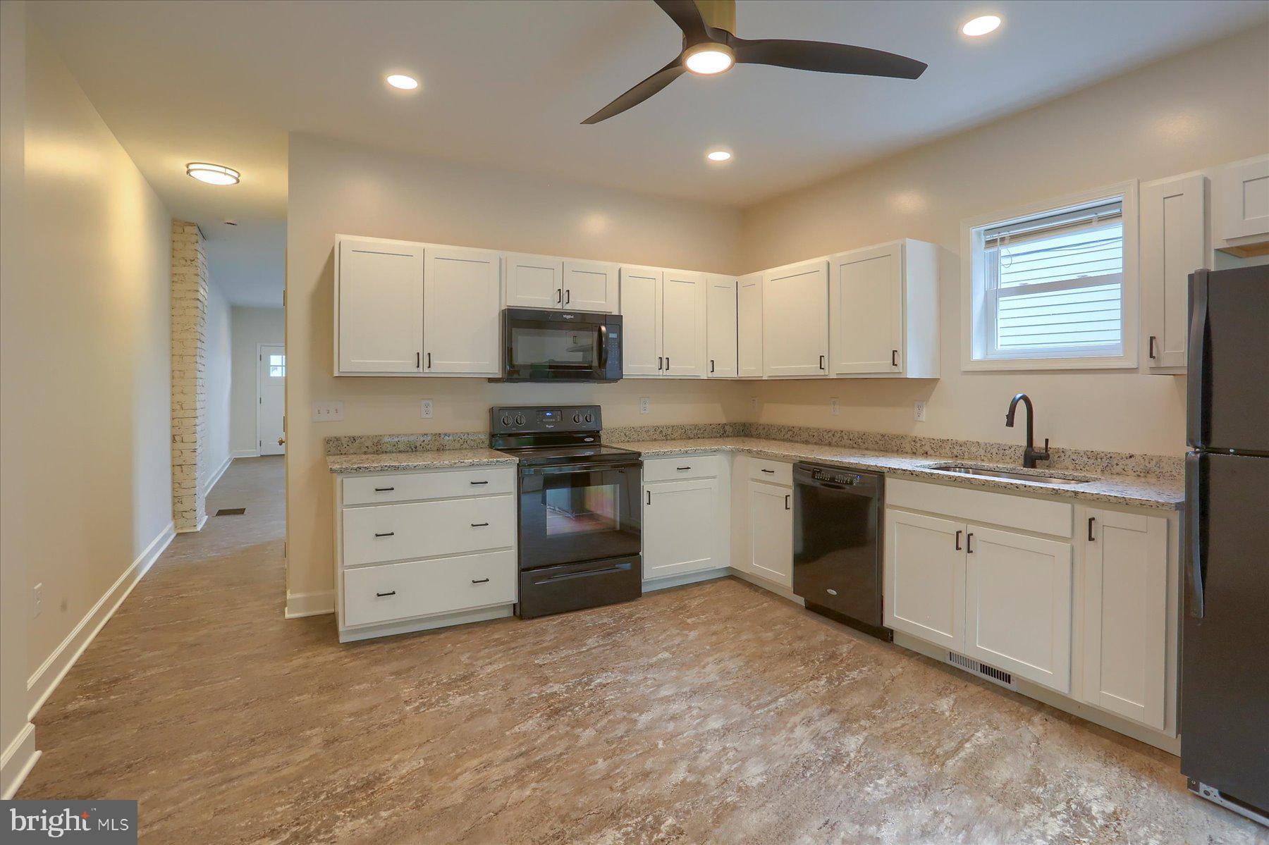 12 South Main Street Marysville, PA 17053 - Photo 8 of 20 a kitchen with appliances a sink and cabinets