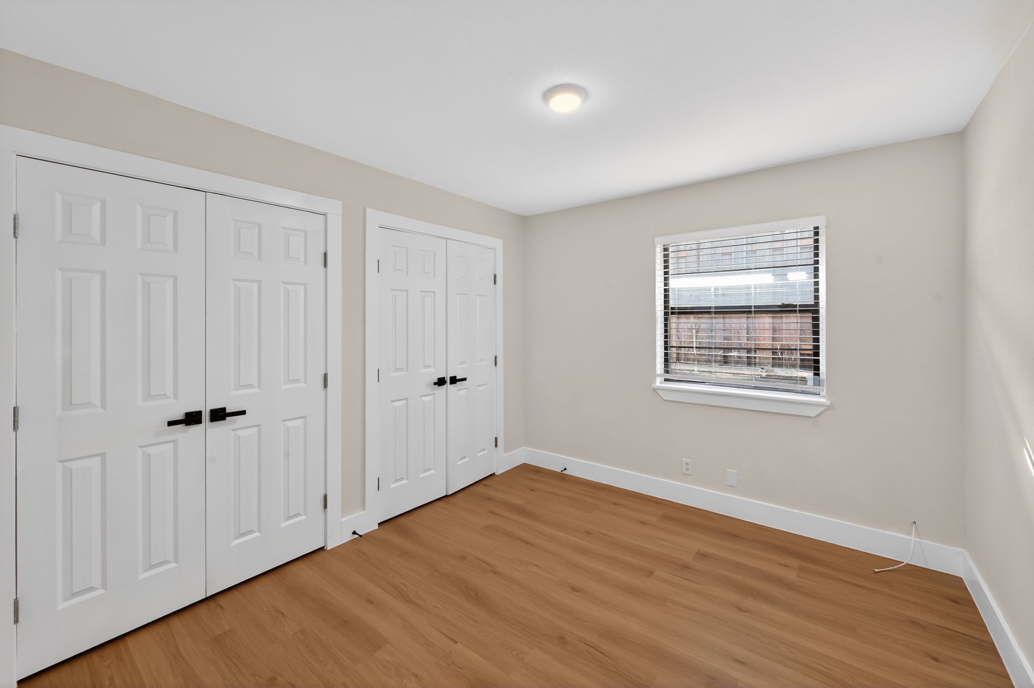 5928 Signal Point Austin, TX 78724 - Photo 11 of 14 a view of an empty room with wooden floor