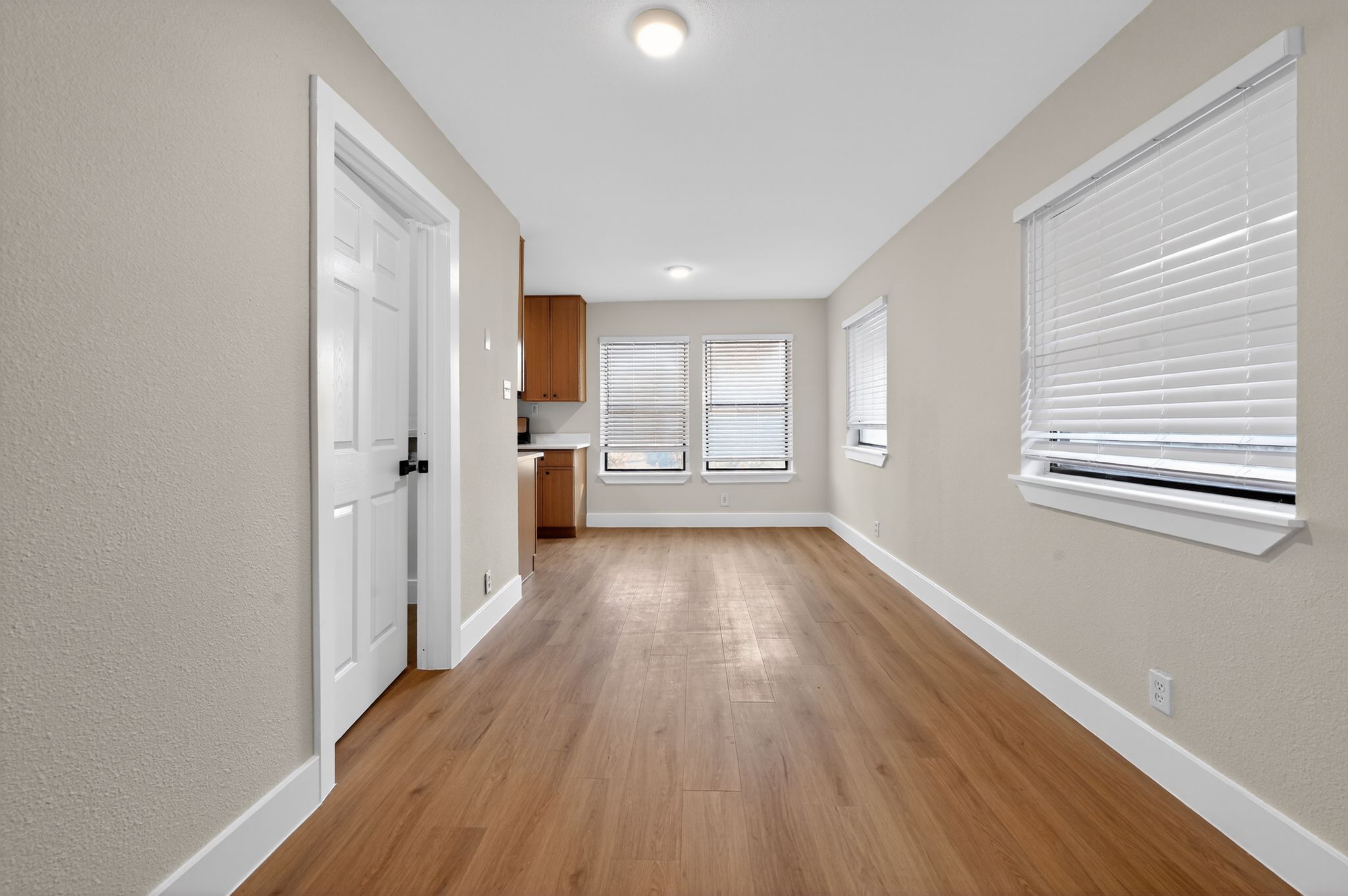 5928 Signal Point Austin, TX 78724 - Photo 6 of 14 a view of a room with wooden floor and window