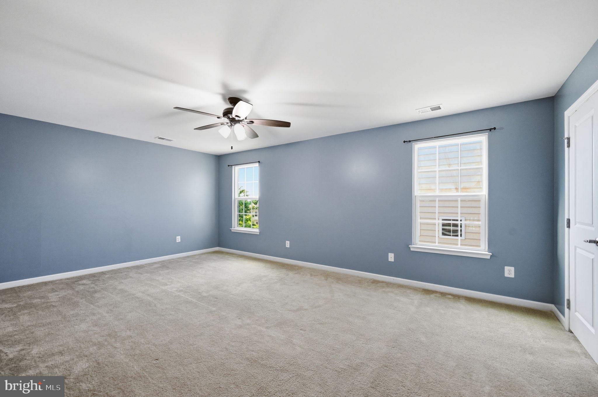 687 Blossom Tree Road Culpeper, VA 22701 - Photo 17 of 31 a view of an empty room with a window