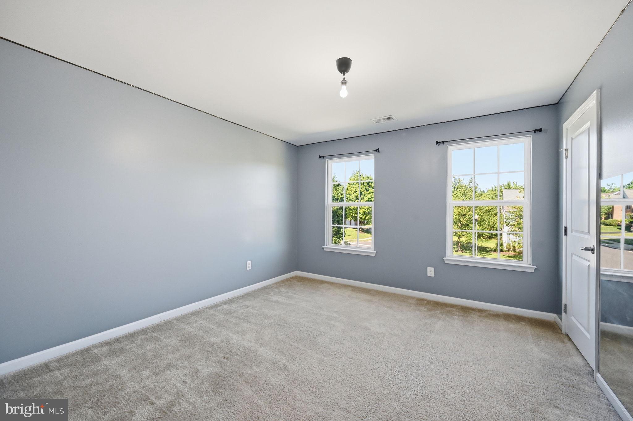 687 Blossom Tree Road Culpeper, VA 22701 - Photo 22 of 31 an empty room with windows