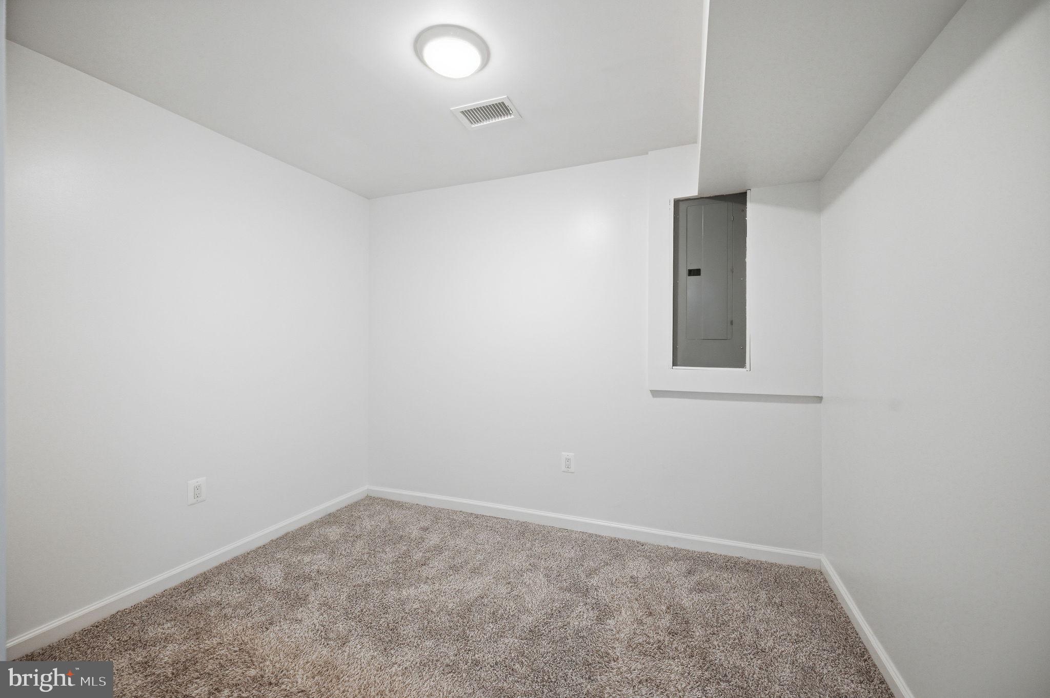 687 Blossom Tree Road Culpeper, VA 22701 - Photo 24 of 31 an empty room with a window