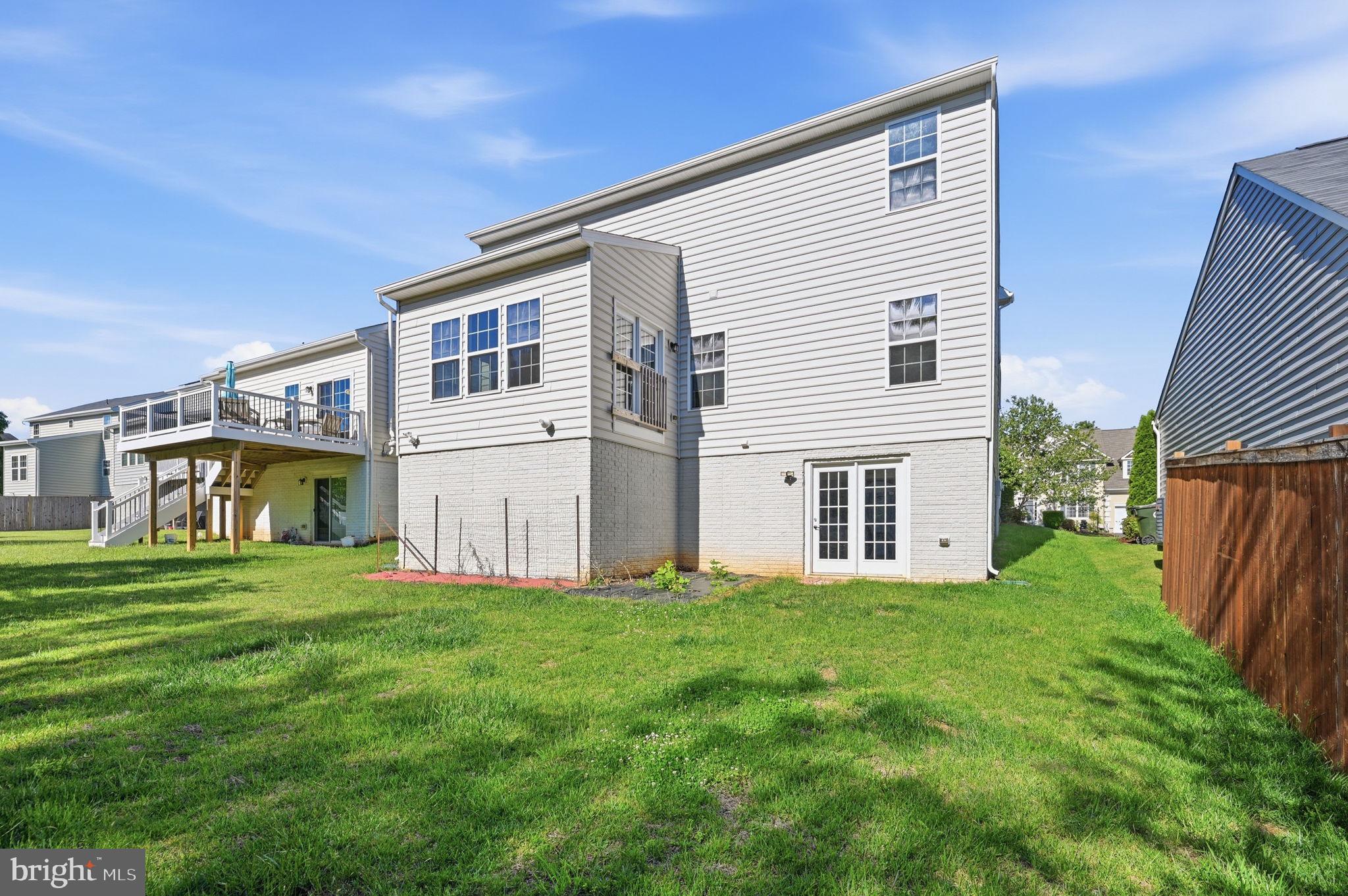 687 Blossom Tree Road Culpeper, VA 22701 - Photo 31 of 31 a big house with a big yard and more windows