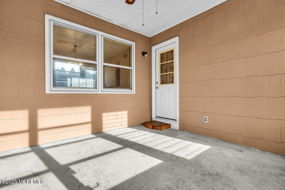 50 Oakfield Road Toms River, NJ 08757 - Photo 15 of 33 a view of an empty room with a window