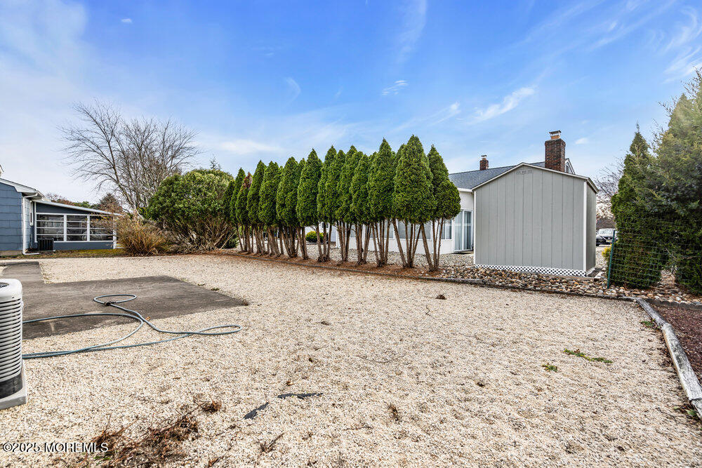 50 Oakfield Road Toms River, NJ 08757 - Photo 32 of 33 a view of a backyard with a tree