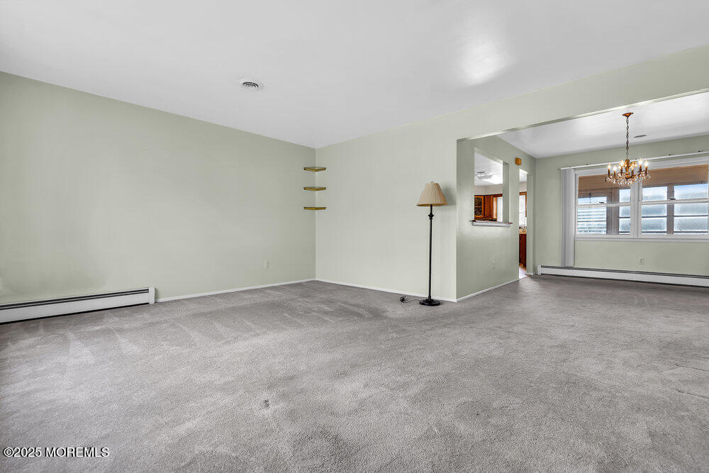 50 Oakfield Road Toms River, NJ 08757 - Photo 9 of 33 a view of a room with a fireplace