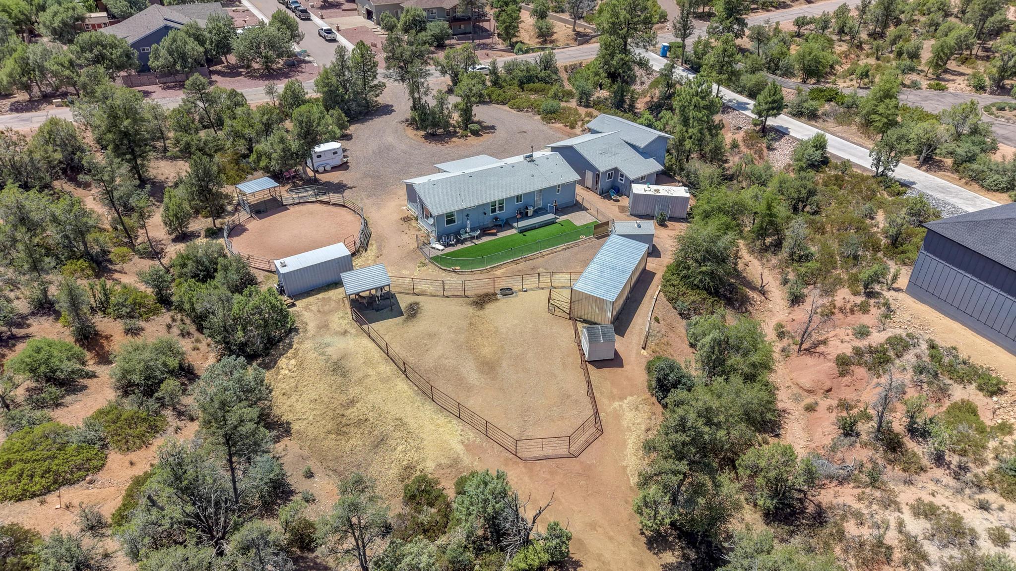 1211 Heather Circle Payson, AZ 85541 - Photo 2 of 51 an aerial view of a house with outdoor space and trees all around