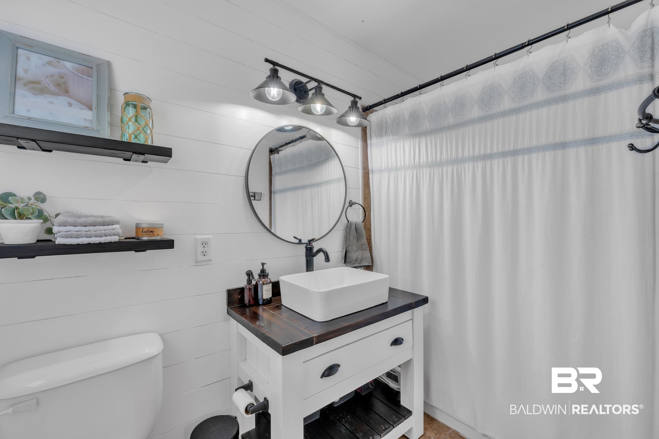 224 Cache Circle Mobile, AL 36611 - Photo 19 of 42 Full bathroom with toilet, vanity, and a shower with shower curtain