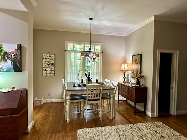 a bedroom with a bed and dresser