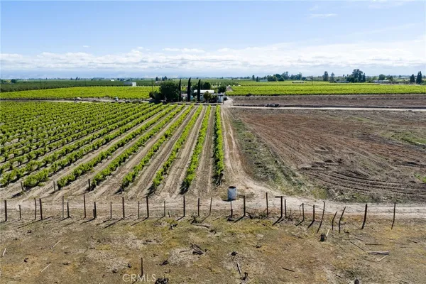 a view of an ocean beach and city