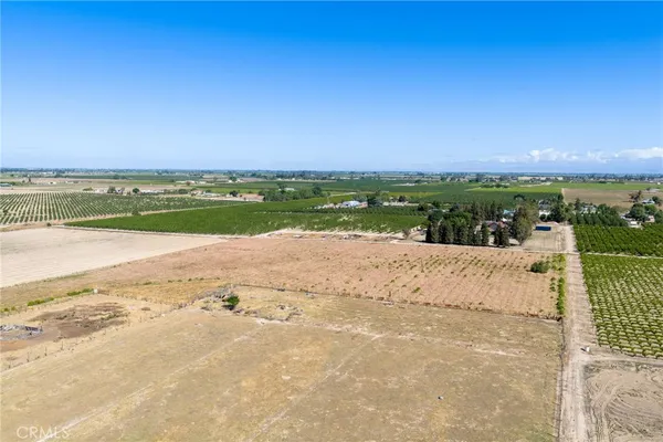 a view of swimming pool with outdoor seating and city view