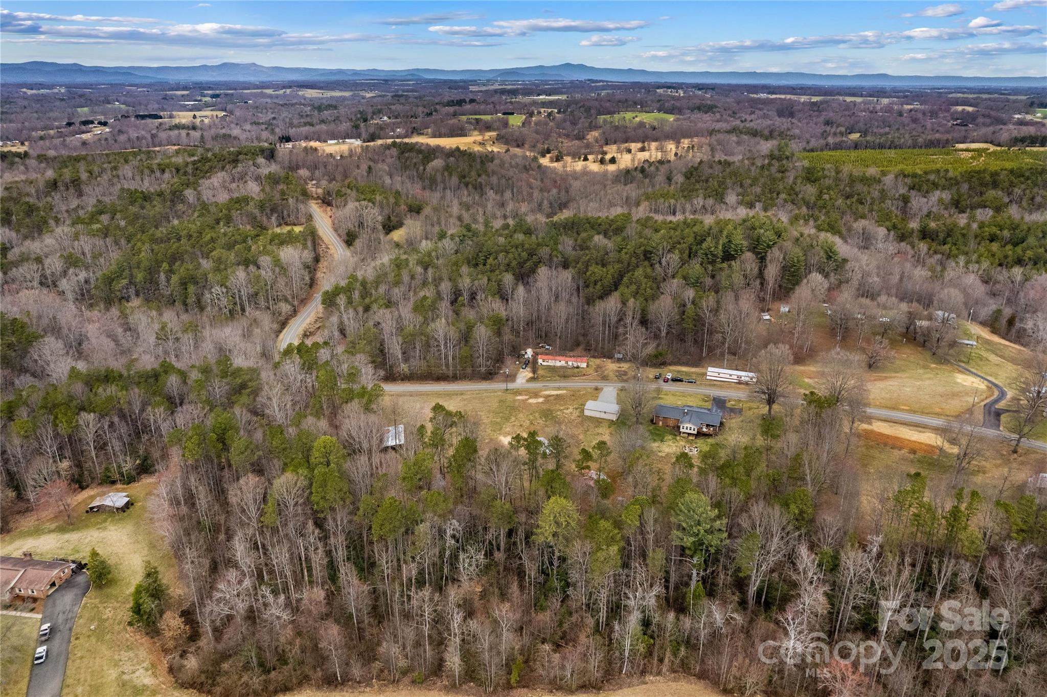 0 Stanley Mill Road, Unit 1 Elkin, NC 28621 - Photo 15 of 17 a view of lake with mountain