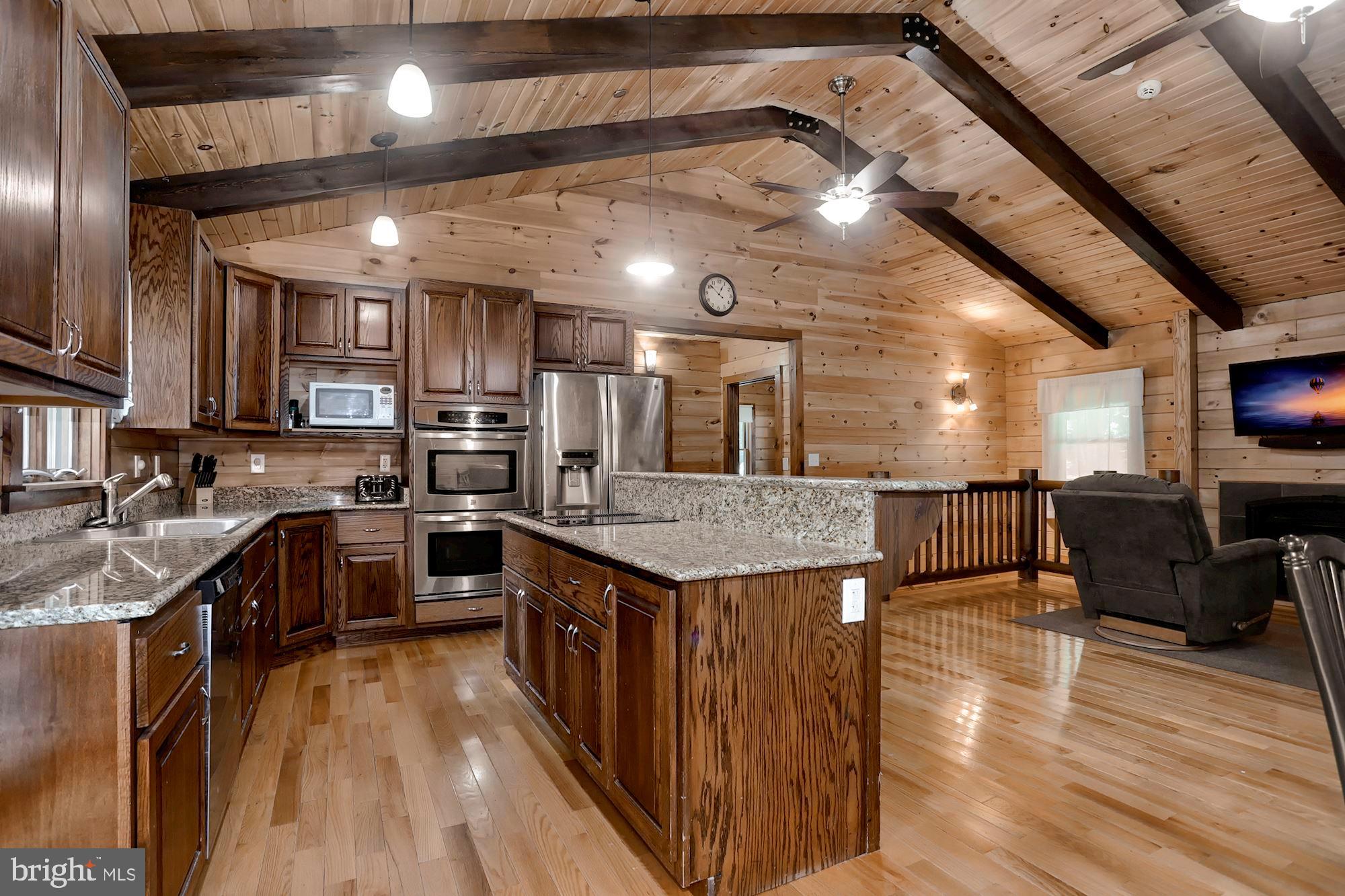 4154 Back Woods Road Westminster, MD 21158 - Photo 6 of 27 Eat-In Kitchen | Center Island | Breakfast Bar