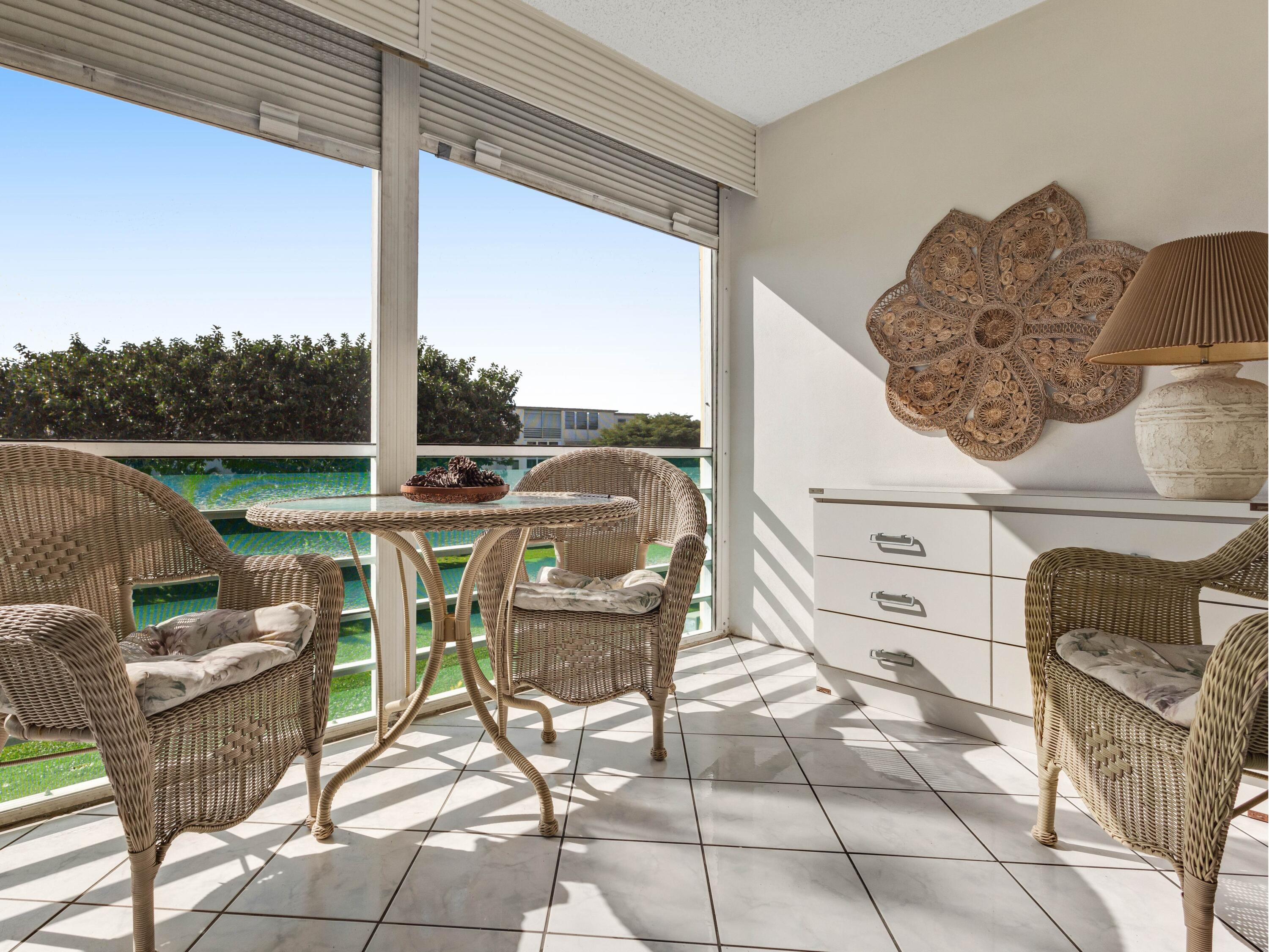 2615 Northeast 3rd Street, Unit 317 Boynton Beach, FL 33435 - Photo 16 of 38 a living room filled with furniture