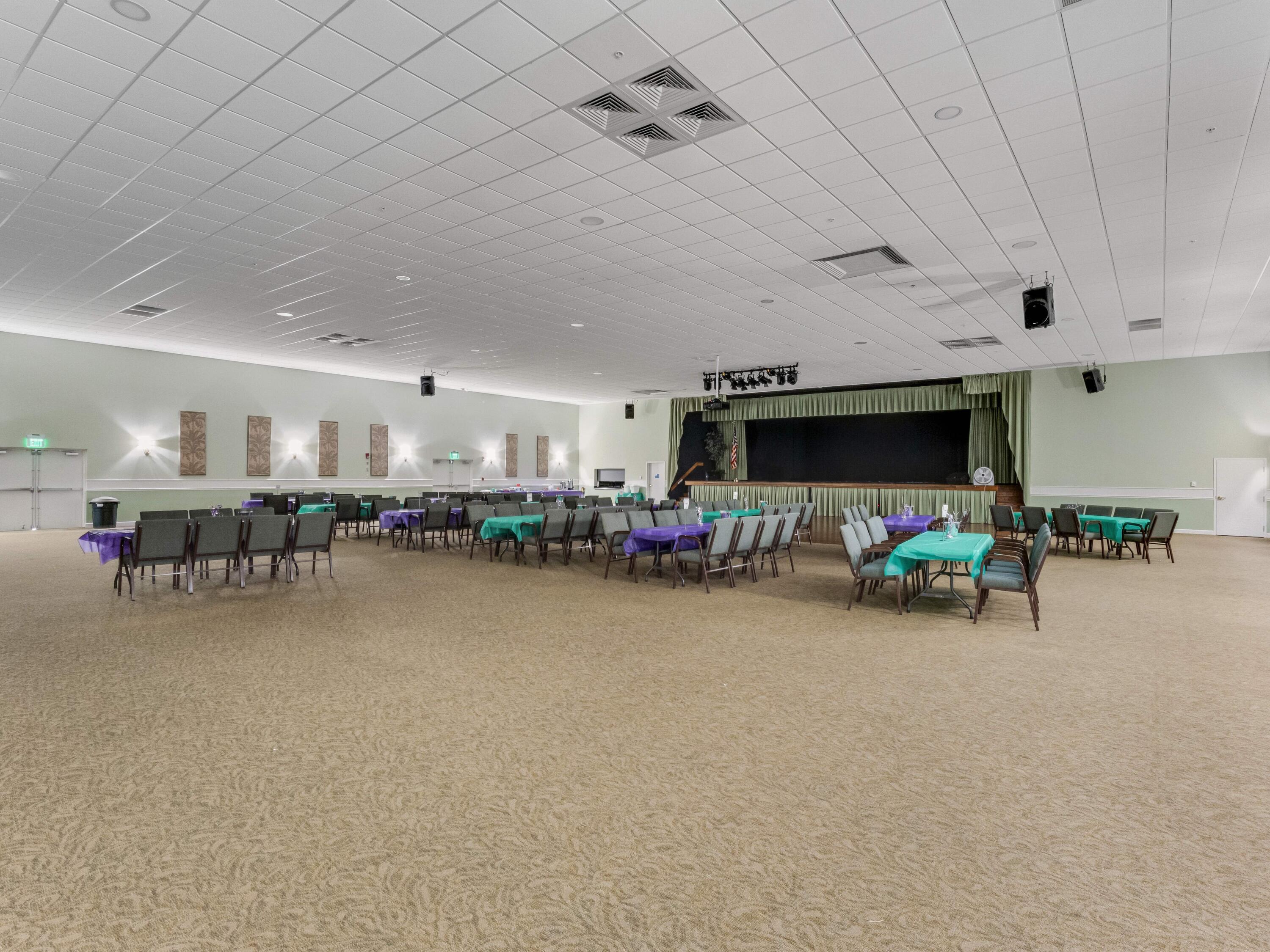 2615 Northeast 3rd Street, Unit 317 Boynton Beach, FL 33435 - Photo 30 of 38 a room with furniture and a flat screen tv