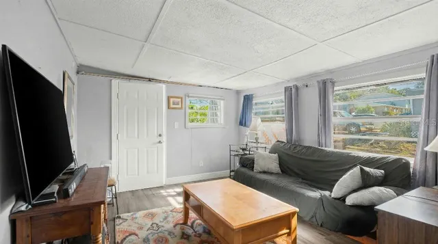 a kitchen with stainless steel appliances a refrigerator and a stove top oven