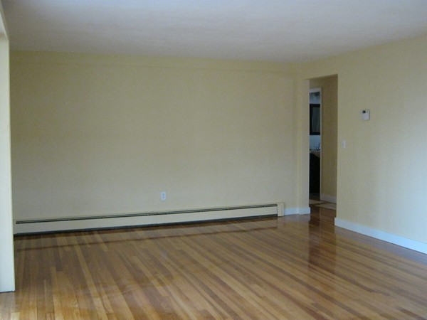 19 Rydal Street Worcester, MA 01602 - Photo 9 of 19 a view of an empty room with wooden floor