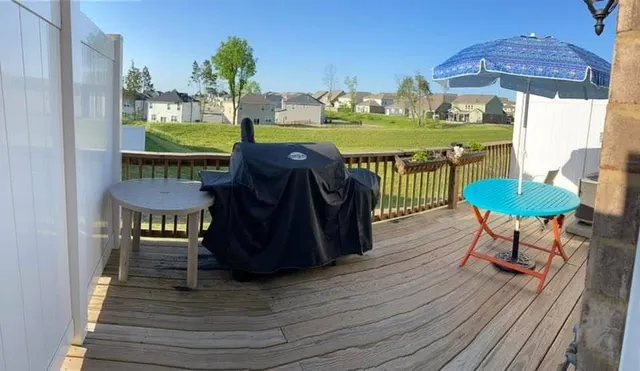 a view of a chairs and table on the wooden floor