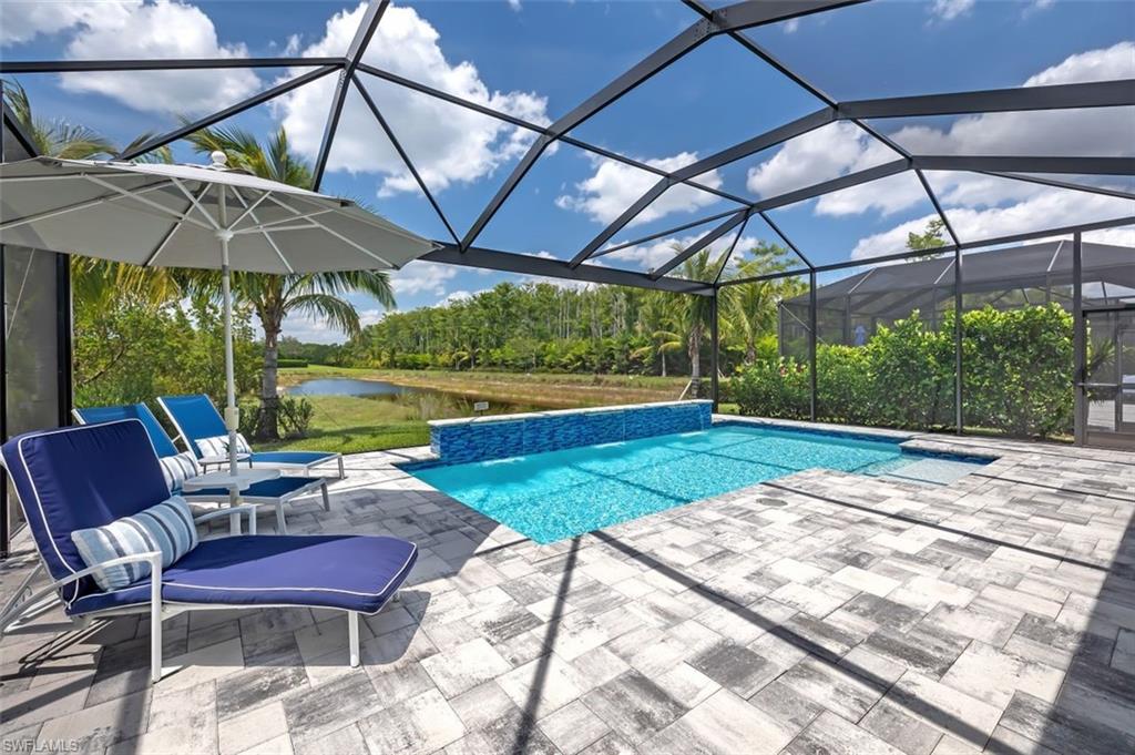 a chair and tables in the patio
