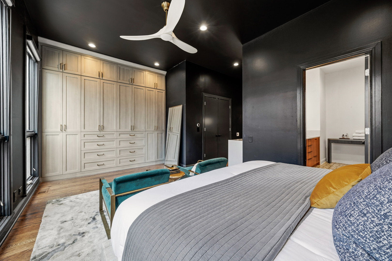 438 East North Water Street Chicago, IL 60611 - Photo 19 of 42 a bedroom with a bed and a large mirror