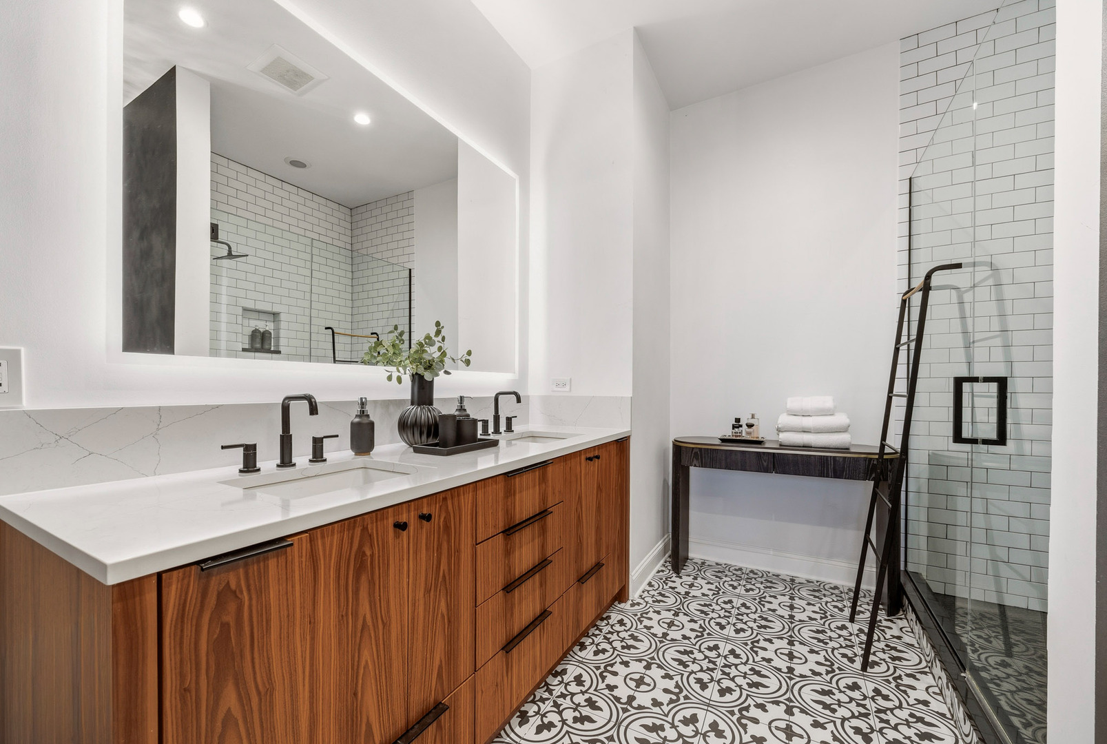 438 East North Water Street Chicago, IL 60611 - Photo 20 of 42 a bathroom with a sink a toilet and mirror