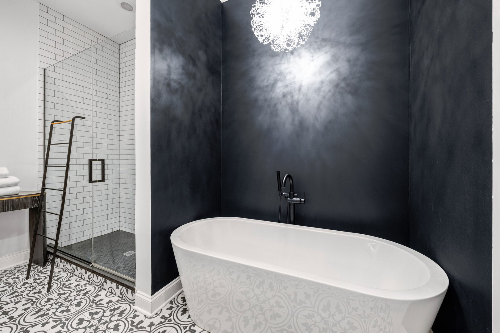 438 East North Water Street Chicago, IL 60611 - Photo 21 of 42 a bathroom with a bathtub and shower