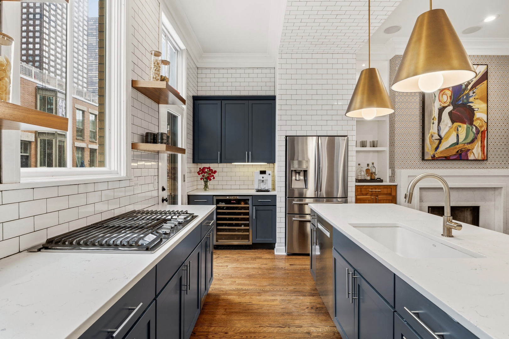 438 East North Water Street Chicago, IL 60611 - Photo 4 of 42 a kitchen with a stove and a kitchen island