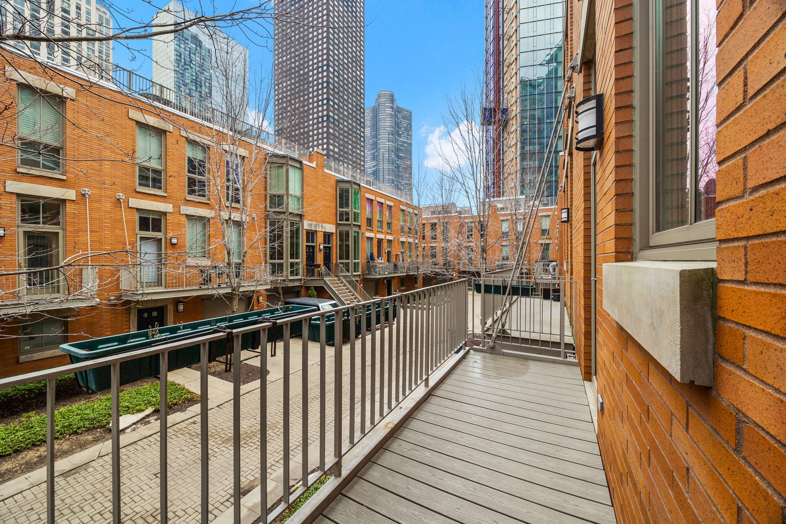438 East North Water Street Chicago, IL 60611 - Photo 6 of 42 a view of a balcony with wooden floor