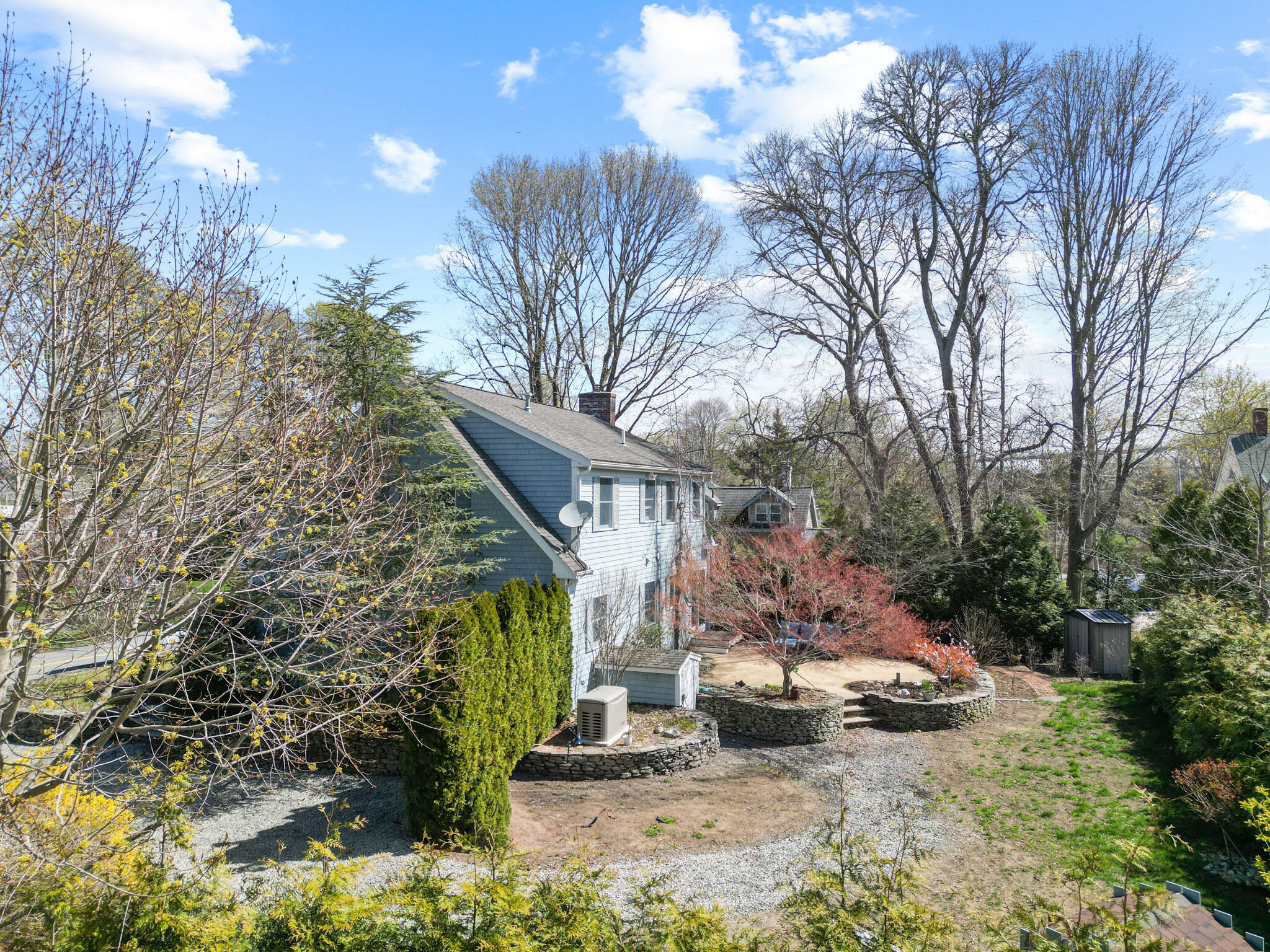 32 Everett Road Buzzards Bay, MA 02532 - Photo 29 of 33 a view of a yard with plants and a trees