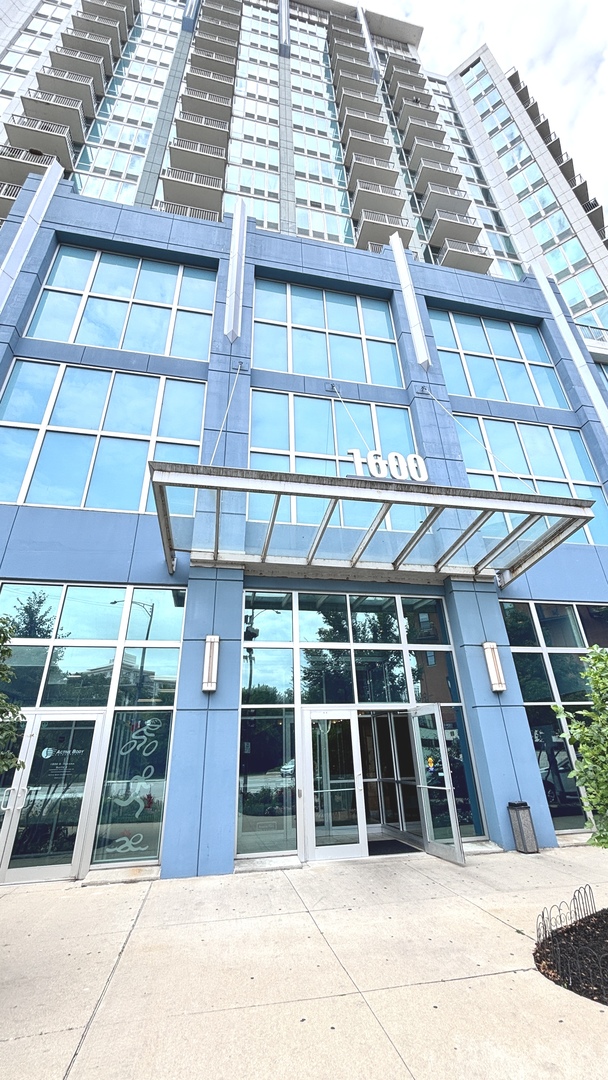 a view of a large building with a porch