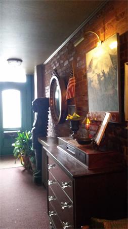 9 Mattoon Street Springfield, MA 01105 - Photo 6 of 16 a room with a table and chairs in it