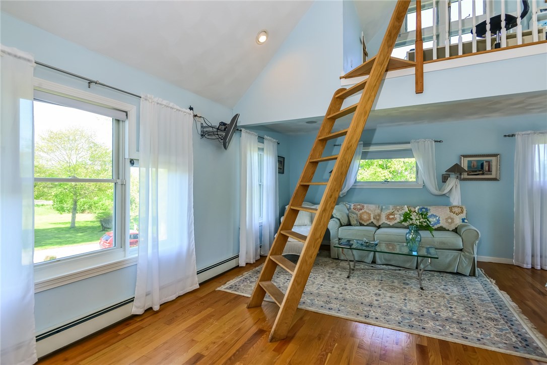 41 Decatur Avenue Jamestown, RI 02835 - Photo 19 of 31 Ladder to loft in 2nd floor master bedroom. Sitting area behind it.