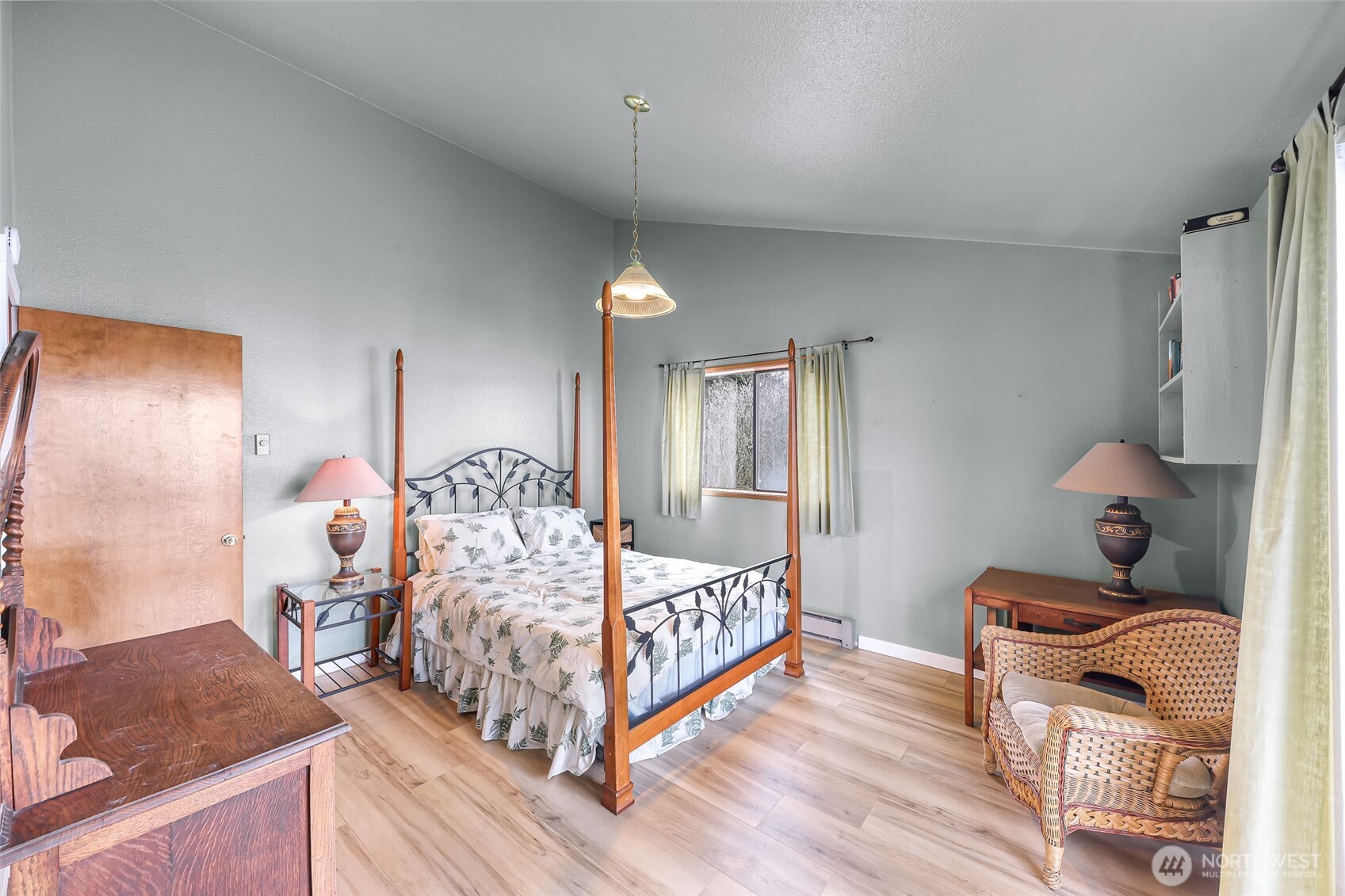 4877 Maple Lane Ferndale, WA 98248 - Photo 16 of 35 a bedroom with a bed and wooden floor