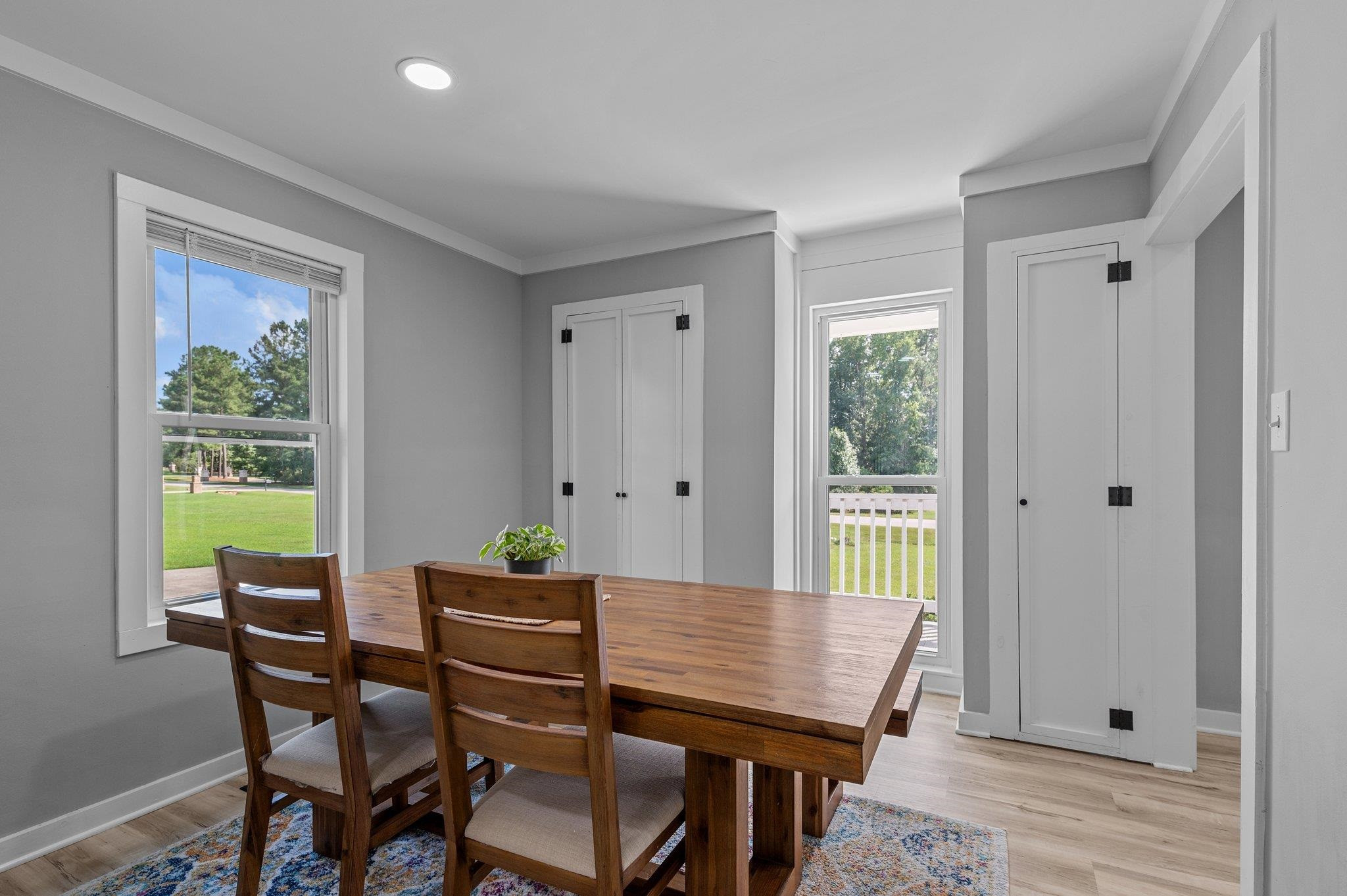 2037 Queen Charlotte Place Raleigh, NC 27610 - Photo 11 of 32 a view of a dining room with furniture window and wooden floor