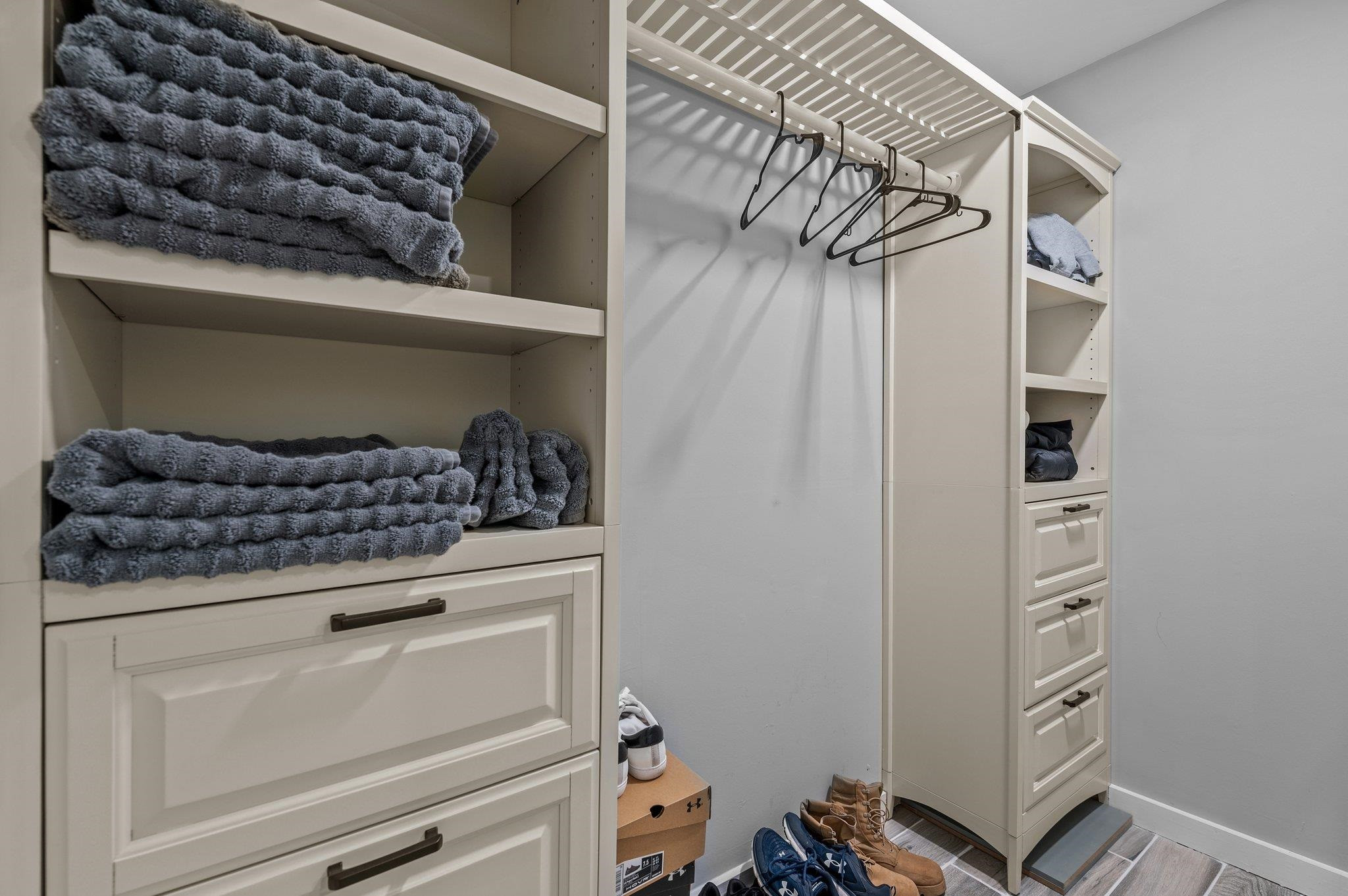 2037 Queen Charlotte Place Raleigh, NC 27610 - Photo 21 of 32 a view of walk in closet with clothes and shoes