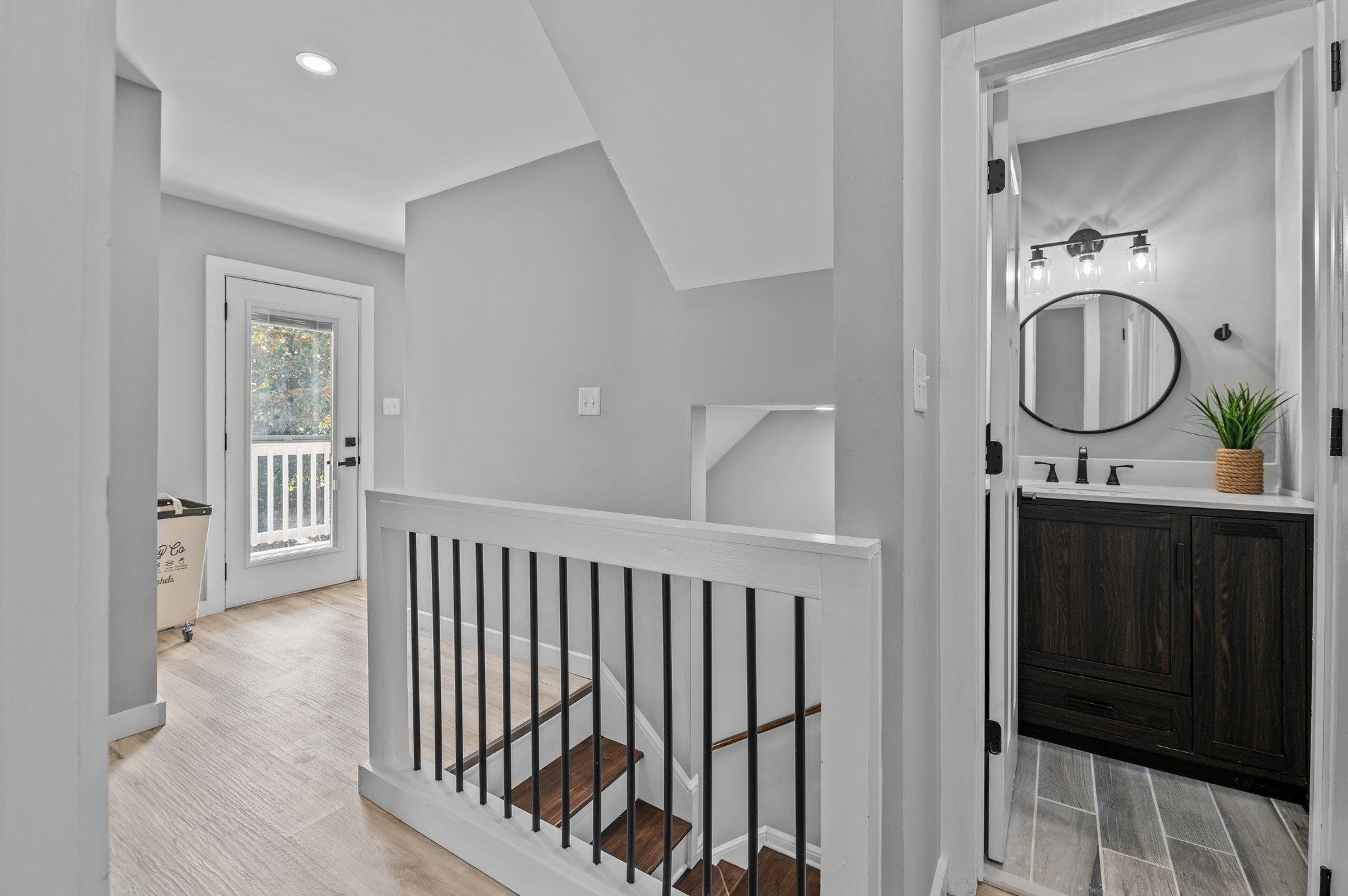 2037 Queen Charlotte Place Raleigh, NC 27610 - Photo 22 of 32 a view of a hallway with washer and dryer