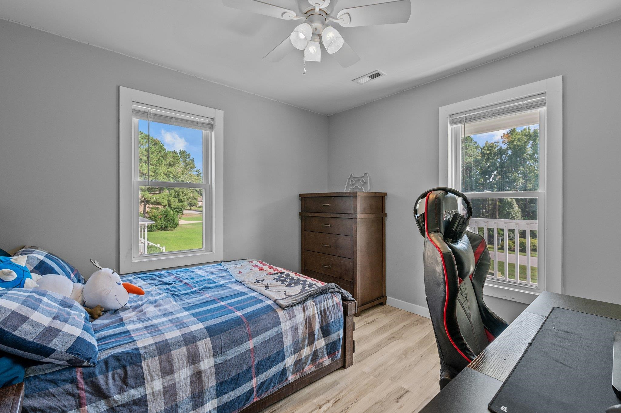 2037 Queen Charlotte Place Raleigh, NC 27610 - Photo 23 of 32 a bedroom with a bed and a window