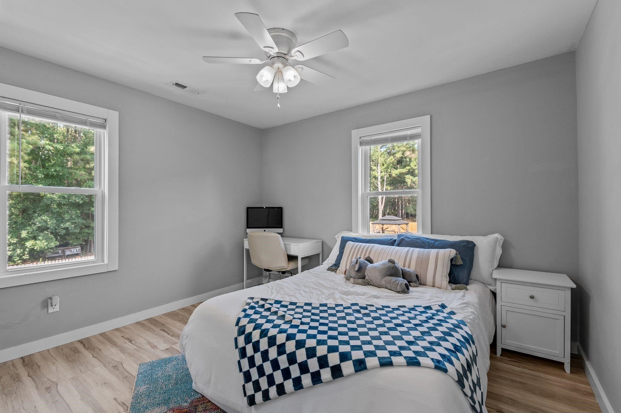 2037 Queen Charlotte Place Raleigh, NC 27610 - Photo 25 of 32 a bedroom with a bed and a window