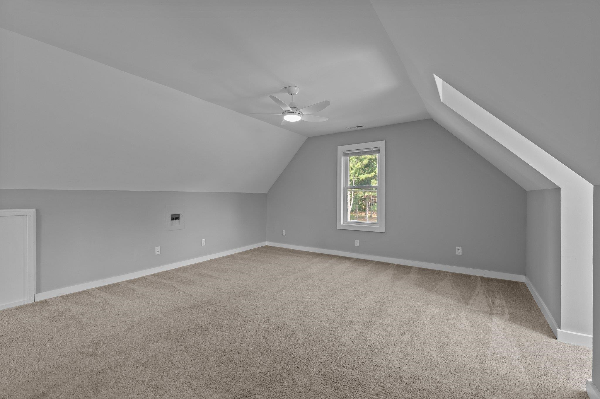 2037 Queen Charlotte Place Raleigh, NC 27610 - Photo 29 of 32 an empty room with windows and closet