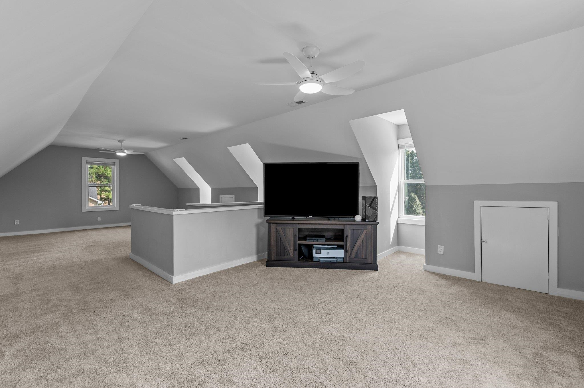 2037 Queen Charlotte Place Raleigh, NC 27610 - Photo 31 of 32 a view of a livingroom with furniture and a flat screen tv