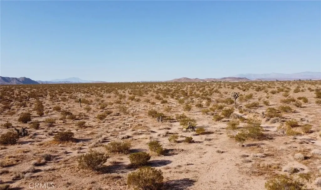 0 Border Joshua Tree, CA 92252 - Photo 2 of 12 an aerial view of residential space with parking space