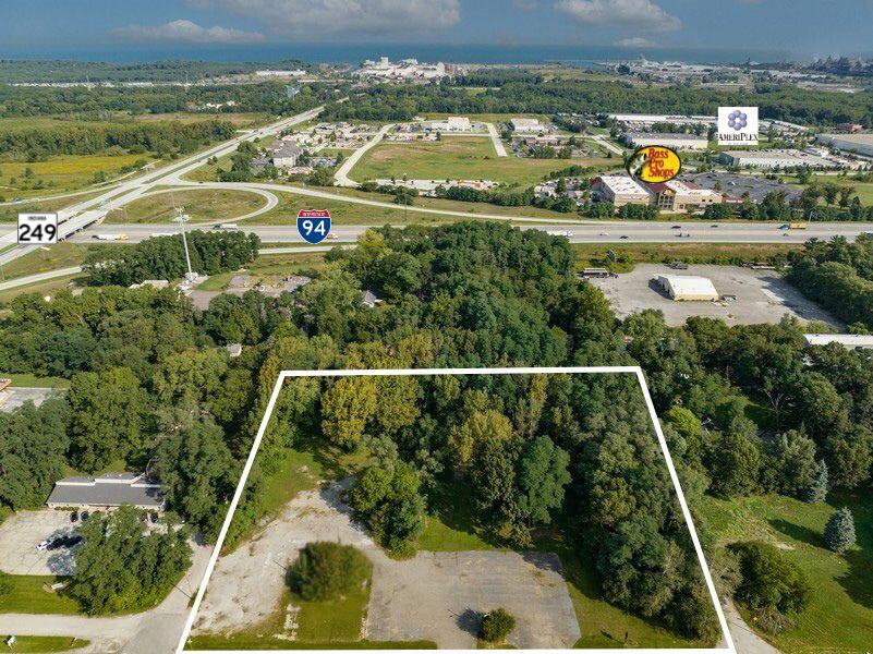 6340 Melton Road Portage, IN 46368 - Photo 4 of 6 an aerial view of residential houses with outdoor space