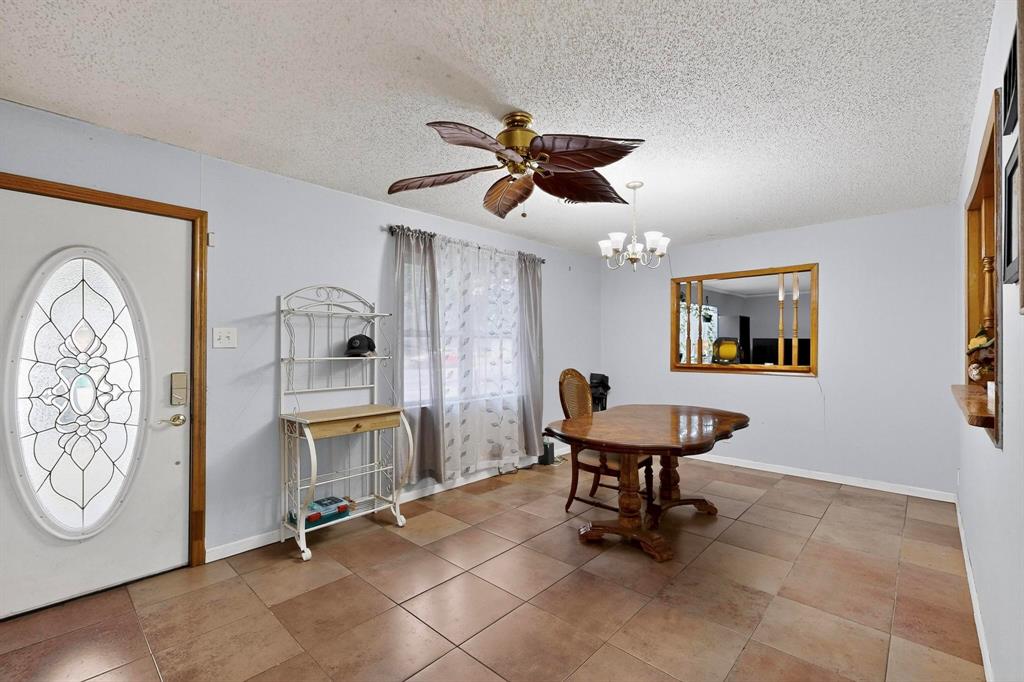 418 Hillside Drive Gainesville, TX 76240 - Photo 11 of 39 a view of a room with gym equipment