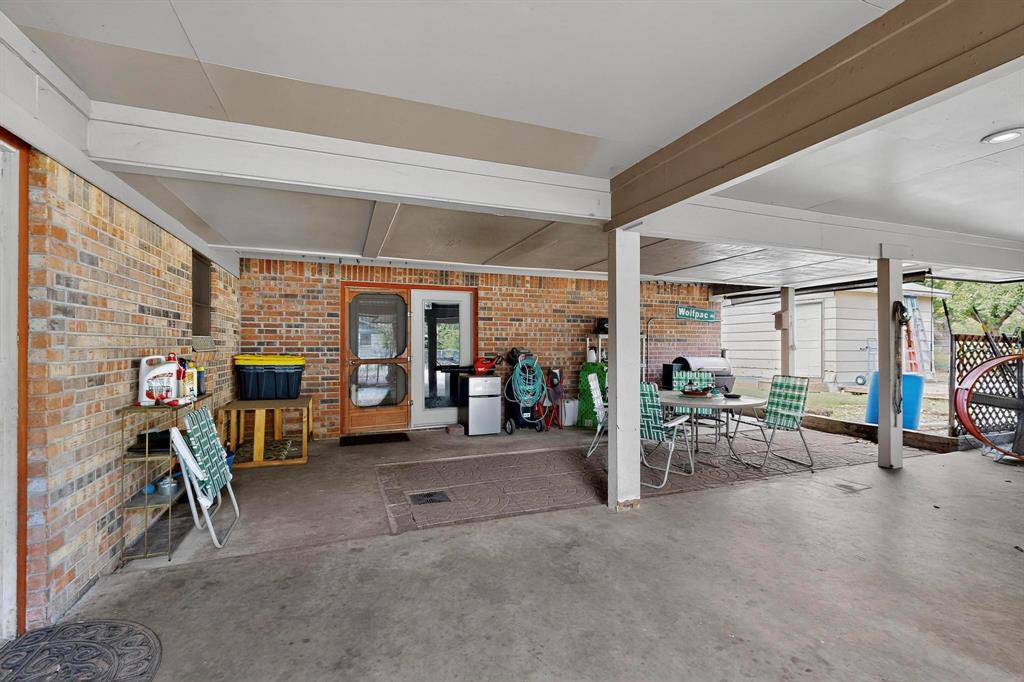 418 Hillside Drive Gainesville, TX 76240 - Photo 31 of 39 a view of a room with gym equipment