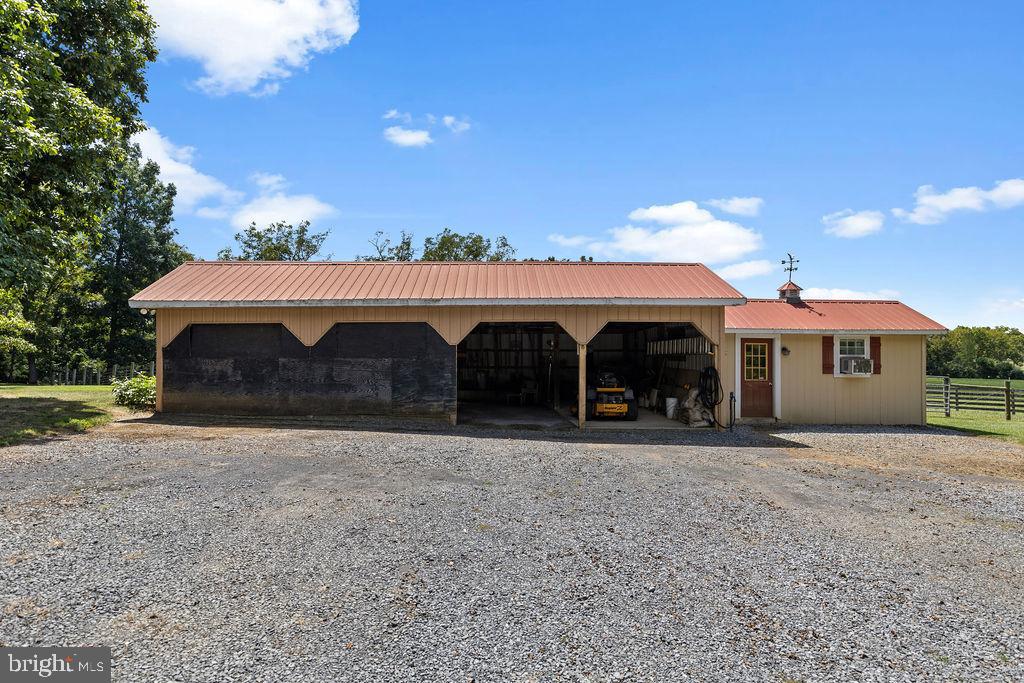 1115 Chapel Road Middletown, VA 22645 - Photo 46 of 54 a front view of a house with garden