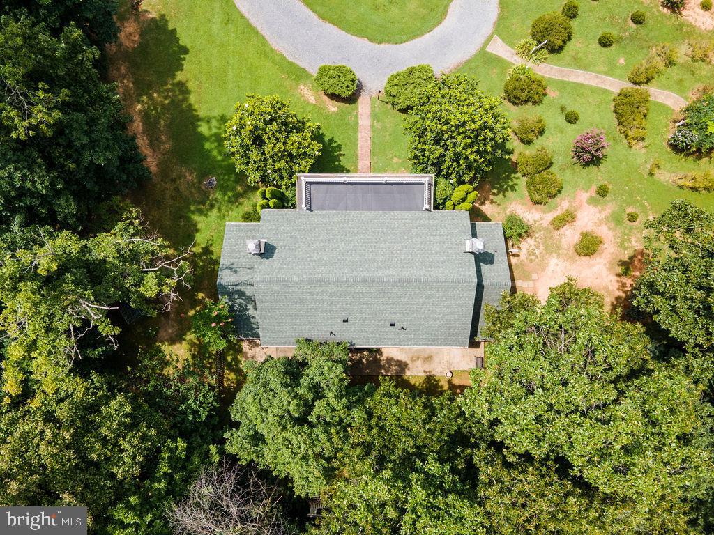 1115 Chapel Road Middletown, VA 22645 - Photo 10 of 54 an aerial view of a house with a yard and garden