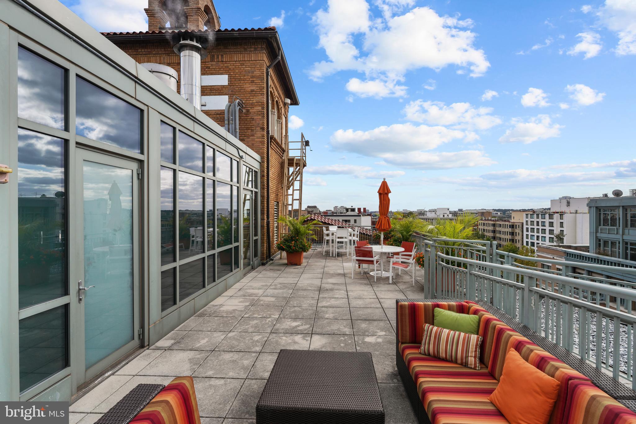 2425 L Street Northwest, Unit 431 Washington, DC 20037 - Photo 27 of 29 a view of a terrace with couches