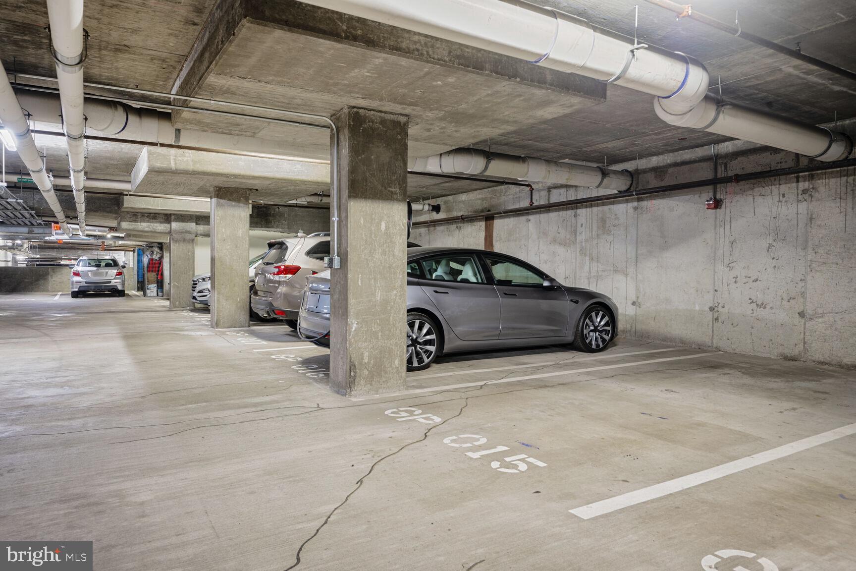 2425 L Street Northwest, Unit 431 Washington, DC 20037 - Photo 28 of 29 a view of parking garage with cars